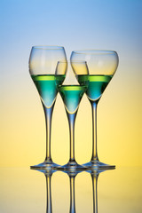 three glasses with cocktails