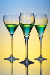 three glasses with cocktails