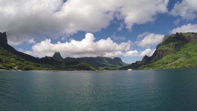Opunohu view from a boat in French Polynesia, moorea. Sunny day with clouds