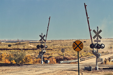 Railroad Crossing in middle of New Mexico desert.