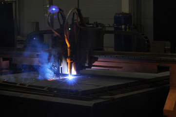 Fototapeta na wymiar metal cutting process using plasma cutting machine