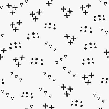 Repeating geometric shapes drawn by hand. Simple seamless pattern with crosses, triangles and round spots. Sketch, doodle.