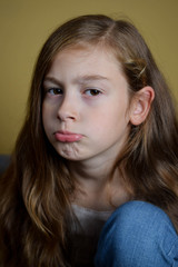 Sad little girl showing frustration and unhappiness.Upset 6-year kid