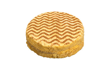 Dark chocolate vegan cake with candies and nuts on white background