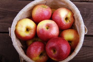 Red apples in the bag.