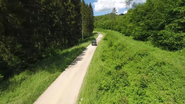 Close follow of a car in the forest Verdun France