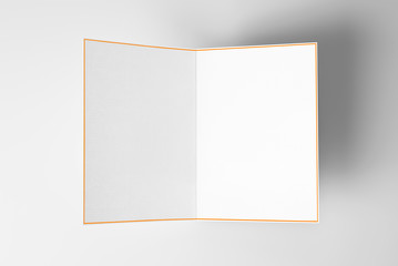 Blank open card with yellow frame over grey background