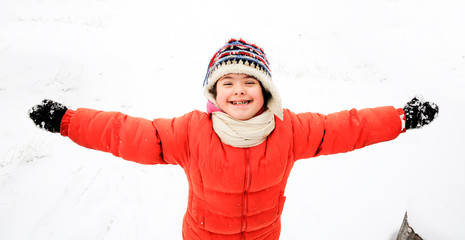 Portrait of beautiful little girl in the winter