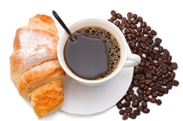 coffee mug with croissant and coffee beans on a white background