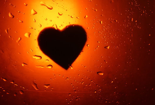 abstract water drop background red orange light spot heart silhouette