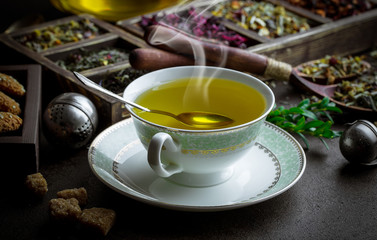 Tea in a cup on an old background