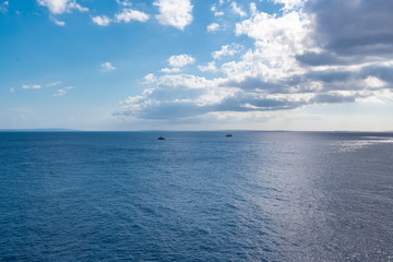 Fototapeta na wymiar Beautiful ocean with two rocks, background, Ibiza 