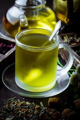 Tea in a cup on an old background