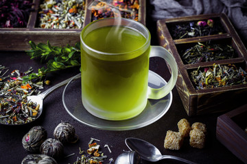 Tea in a cup on an old background