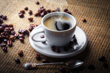 Black coffee on old background