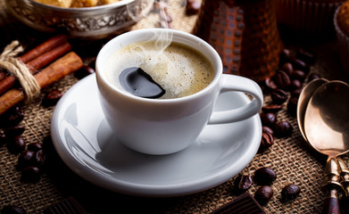 Black coffee on old background