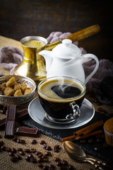 Black coffee on old background