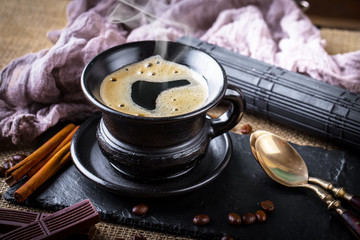 Black coffee on old background