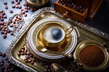 Black coffee on old background