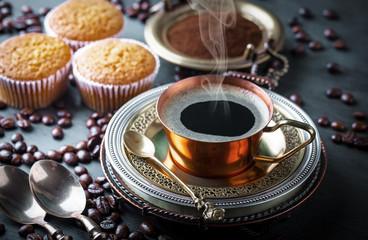 Black coffee on old background