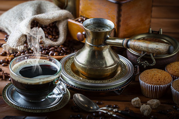 Black coffee on old background