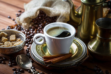 Black coffee on old background