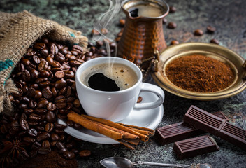 Black coffee on old background