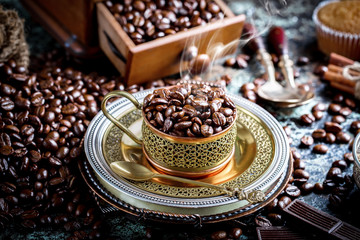 Black coffee on old background