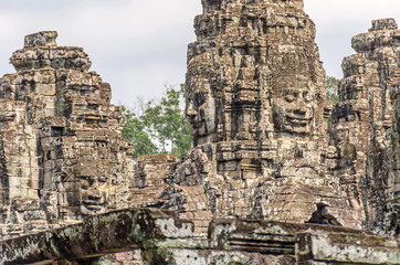 Fototapeta premium Smiling stone faces of the Bayon temple in Angkor Thom in Cambodia