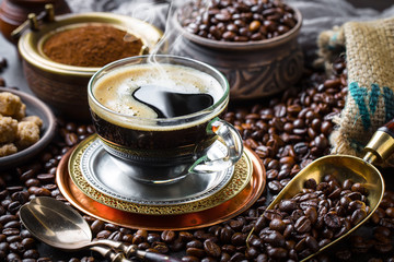 Black coffee on old background