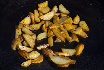 French fries frying in hot oil