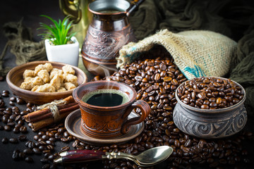 Black coffee on old background