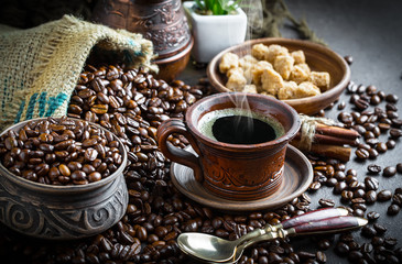 Black coffee on old background