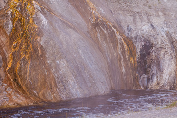 Yellowstone national park landscape. Geothermal activity, hot thermal springs with boiling water and fumes at Yellowstone National Park, USA