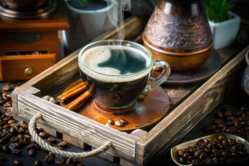 Black coffee on old background