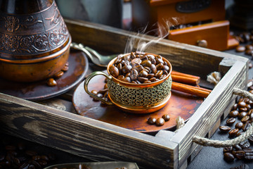 Black coffee on old background