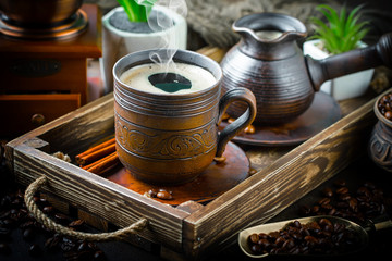 Black coffee on old background