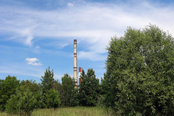 factory pipes and nature	