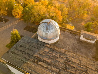 aerial view of old obserbatory dome with telescope inside  f