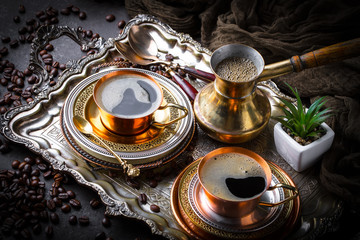 Black coffee on old background
