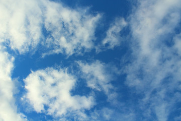 Blue sky and white cirrus clouds. Background. Landscape.