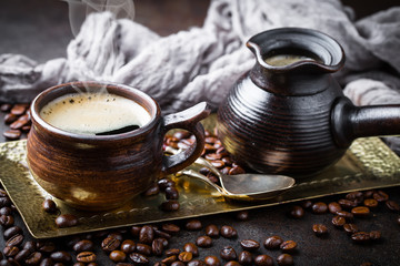Black coffee on old background