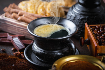 Black coffee on old background