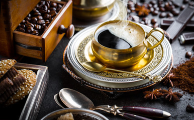 Black coffee on old background