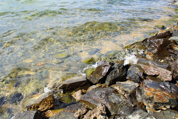 Fototapeta na wymiar Transparent clear lake and stones. Background. Landscape.
