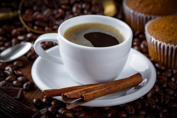 Black coffee on old background
