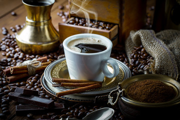 Black coffee on old background