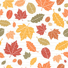 Seamless Vector Bright Colored Autumn Falling Leaves on Shiplap Wood Plank Background