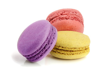 three macaroons isolated on white background closeup