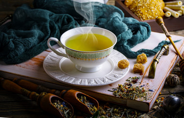 Tea in a cup on an old background